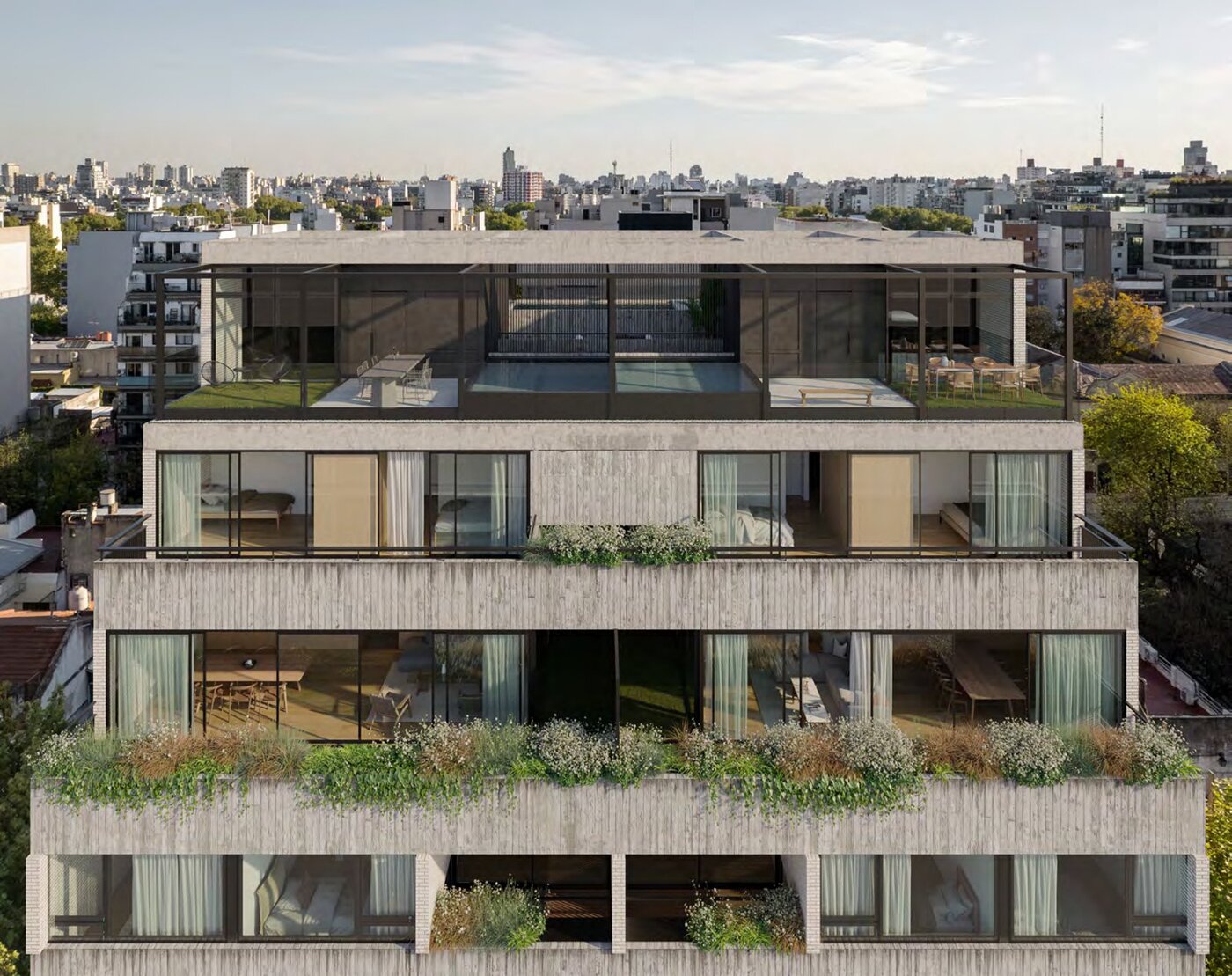 Fachada del edificio con balcones y vegetación