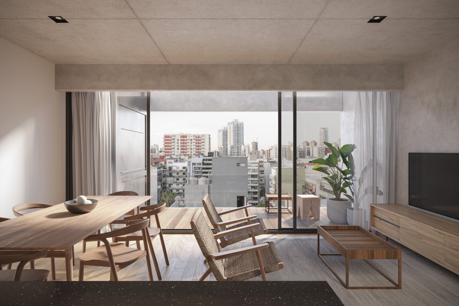 Living-comedor con grandes aberturas y vista a la ciudad