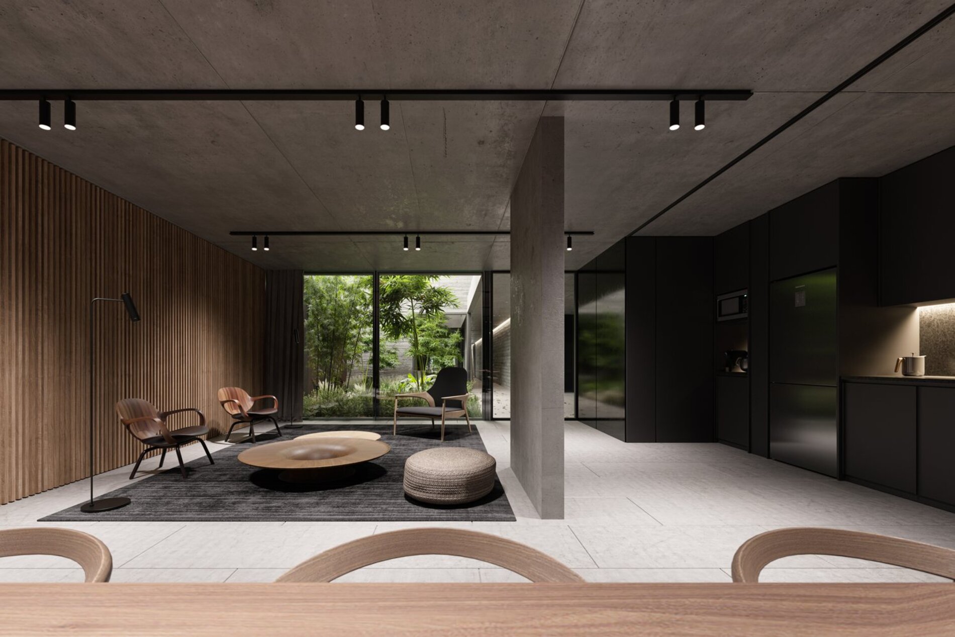 Living amplio con cocina integrada y grandes aberturas